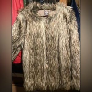 Brand new women’s Fur coat.